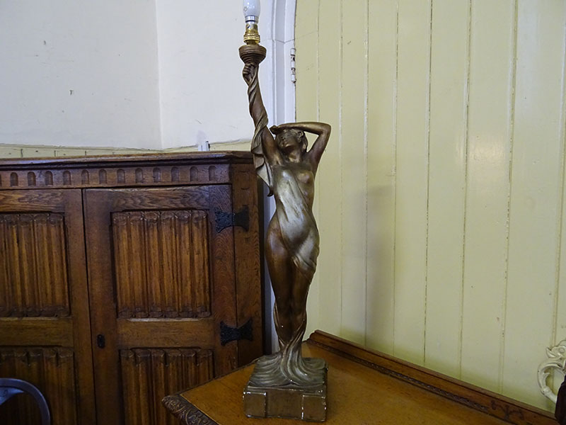 Art Deco plaster figure of a female holding a lamp